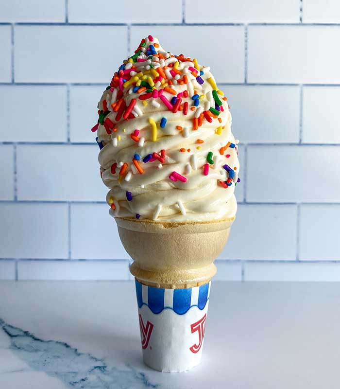 Vanilla softserve cone with sprinkles from Fanci Freeze in Boise and Meridian Idaho.