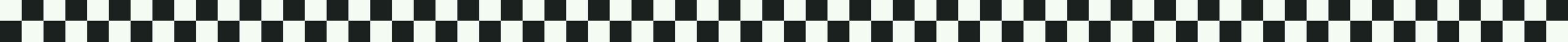 Black and white checkerboard pattern at Fanci Freez Soft Serve.